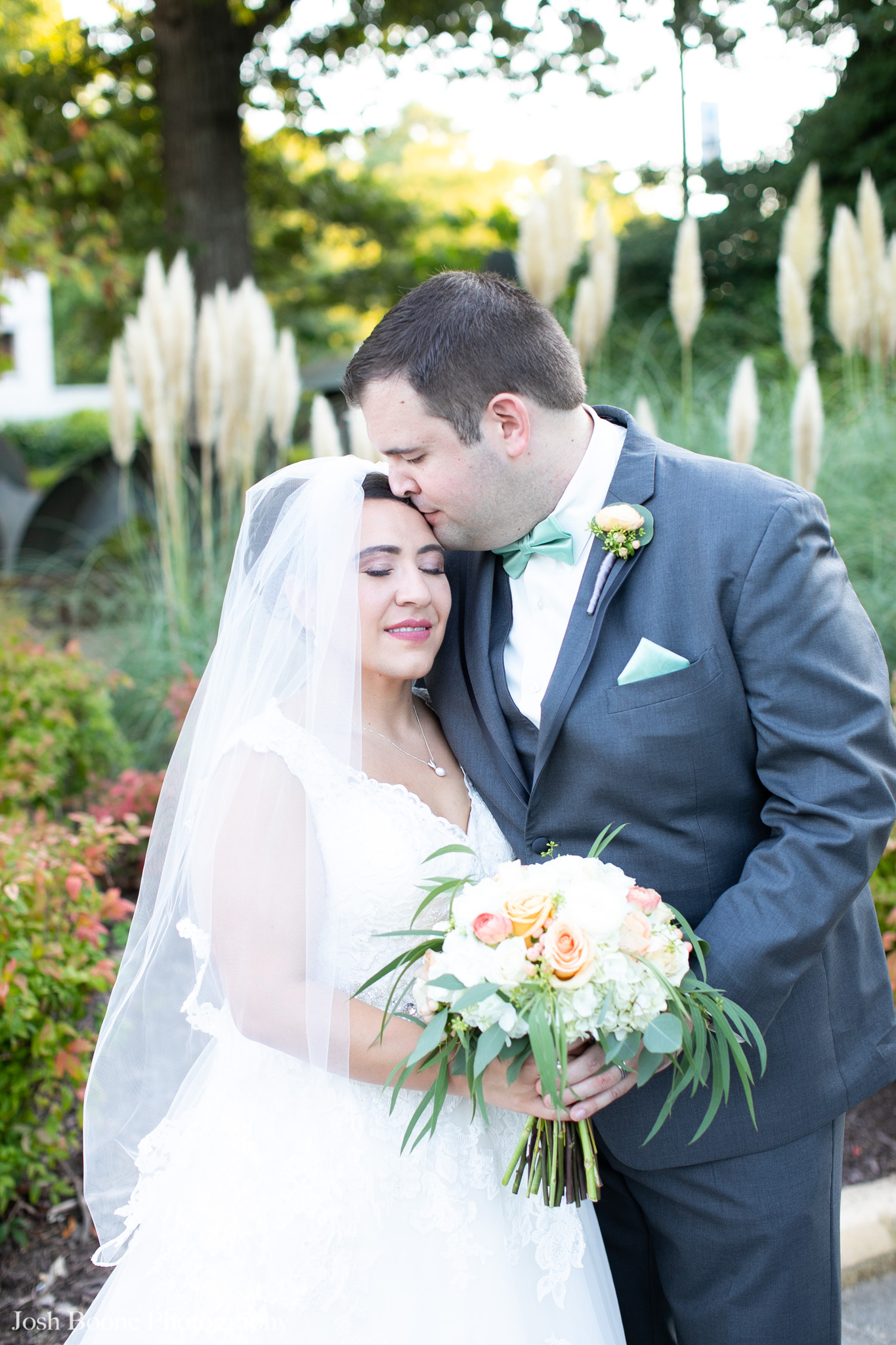 bride and groom kissing