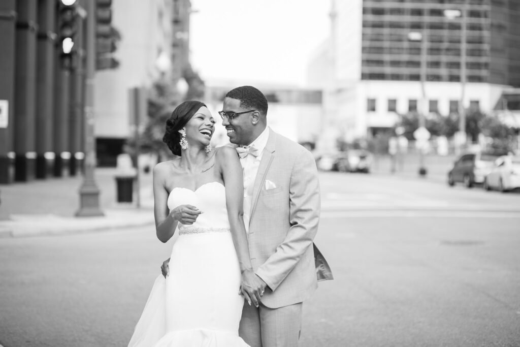 bride and groom in the middle of street