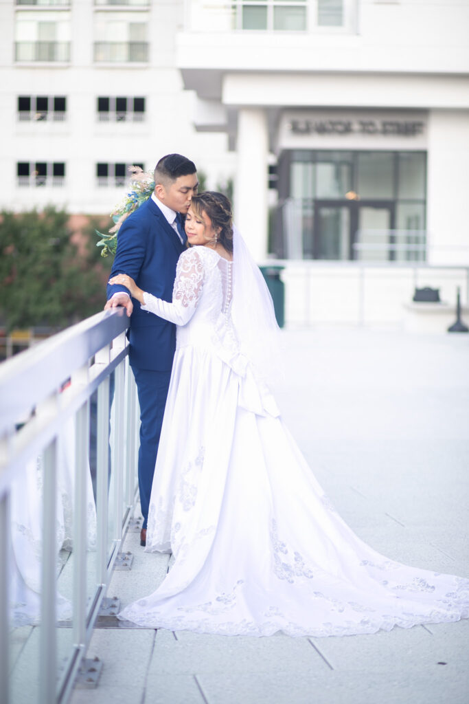 bride and groom on Westin stairs